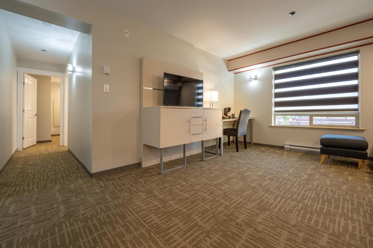 Quality Inn Sunshine Suites Терас Екстериор снимка