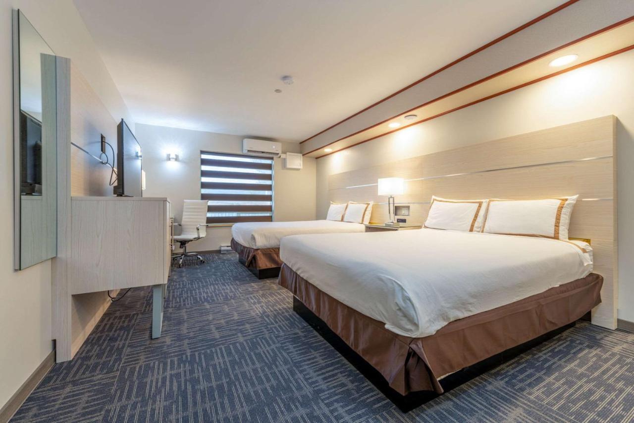 Quality Inn Sunshine Suites Терас Екстериор снимка